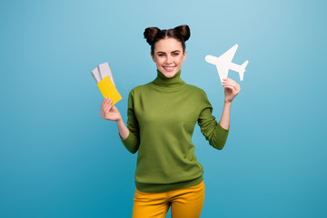 Photo of attractive lady hold paper air plane passport tickets advising flying way of traveling...