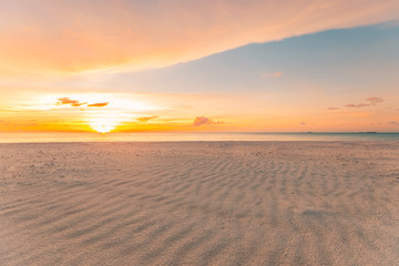 Fototapeta na wymiar Sea sand sky concept, sunset colors clouds, horizon, horizontal background banner. Inspirational nature landscape, beautiful colors, wonderful scenery of tropical beach. Beach sunset, summer vacation