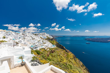 Wonderful scenery of white architecture and blue sea view of Santorini island. Picturesque spring sunrise on the famous Greek resort Thira, Greece, Europe. Traveling concept background.