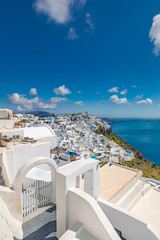 Summer vacation landscape. Beautiful view of famous romantic white town in Santorini Island, Greece