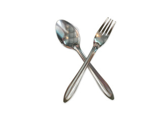 cross silver spoon and fork isolated on white background