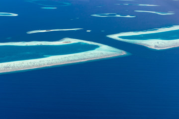 Aerial view of Maldives atolls is the world top beauty. Maldives tourism, luxury travel destination landscape, seascape