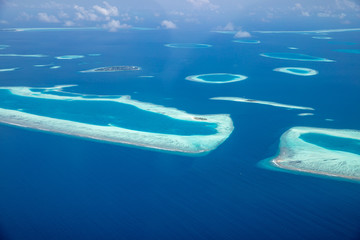 Aerial view of Maldives atolls is the world top beauty. Maldives tourism, luxury travel destination landscape, seascape