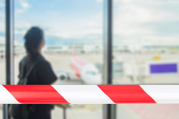 Covid-19 corona virus outbreak concept.Airport security forbidden sick tourist at airport terminal for security check prevent corona virus epidemic