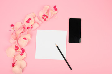 Wedding to do list with flowers on pink background. Floral mockup with paper card
