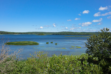Picturesque view of Lake Matapedia (Lac Matapedia) shore near the city of Amqui in Quebec, Canada.