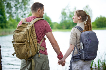 Two travelers near lakes