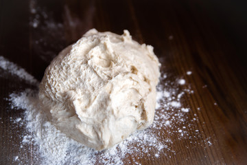 mixed piece of fresh dough for buns and pie