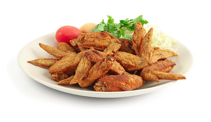 Close up Fried Chicken Wings with Fish Sauce isolated on white background with clipping path.
