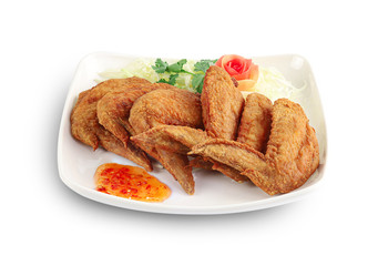 Close up Fried Chicken Wings with Fish Sauce isolated on white background with clipping path.