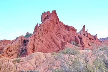 red cliffs in the canyon fairy tale, lake issycula, Kyrgyzia