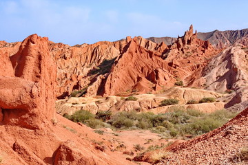 red cliffs in the canyon fairy tale, lake issycula, Kyrgyzia