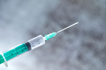 Close-up of medical syringe with drug