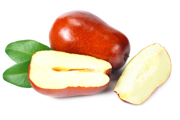 fresh date fruit with sleces and leaves isolated on white background.