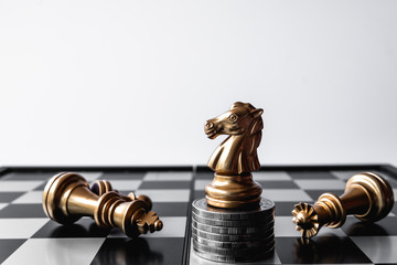 A chess knight last stand as a true winner.Money game concept. Copy space. © tanita