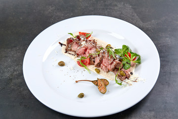 beef with celery puree and salad