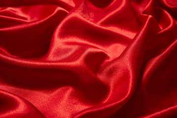 Luxury red satin smooth fabric background for celebration, ceremony, event invitation card or advertising poster