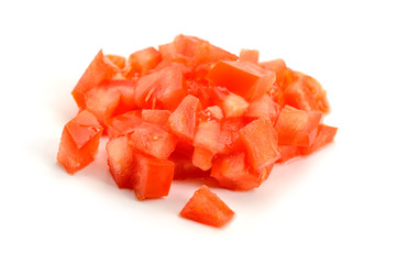 Heap of finely diced tomato on white background