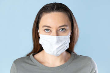 Young woman in medical face protection mask