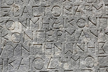 Antique inscription in ancient Greek on stone