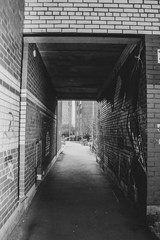 modern arch between buildings in city 