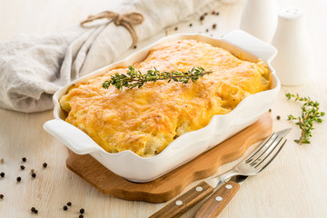 Casserole with cheese.