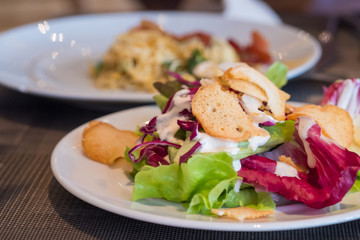 Healthy salad on dish, vacation at the hotel. Healthy food