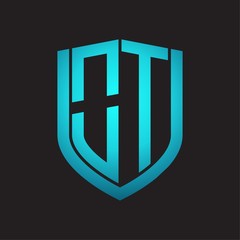 OT Logo monogram with emblem shield design isolated with blue colors on black background