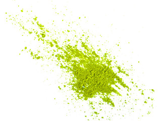 Green tea matcha powder are diffused and diffused. Isolated on a white background. Top view.