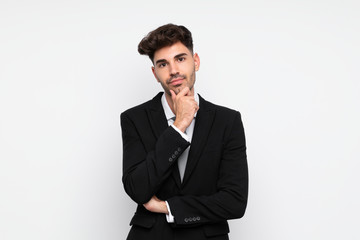Young businessman over isolated white background laughing