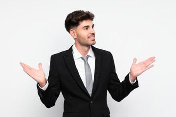 Young businessman over isolated white background with surprise facial expression