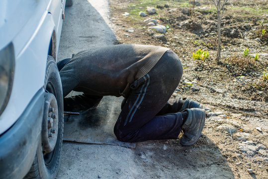 The Guy Under The Car Is Being 