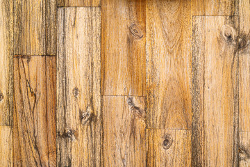 an old black stained wood patterned background.