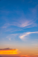 Dusk,Sunset sky twilight in the evening with colorful sunlight and dark blue,majestic ​sky vertical.