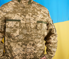 Ukrainian man a warrior dressed in a military pixel uniform
