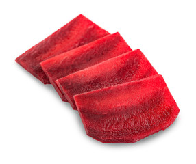 Few beetroot slices on white background, closeup shot