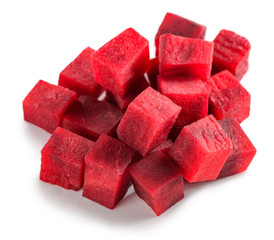 Beetroot diced into cubes on white background