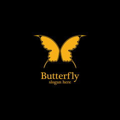 Golden butterfly on black background.logo template for beauty salon,spa salon,etc.