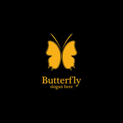 Golden butterfly on black background.logo template for beauty salon,spa salon,etc.