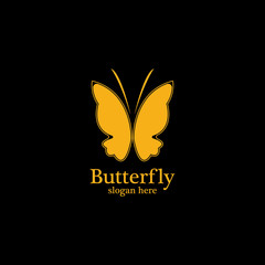 Golden butterfly on black background.logo template for beauty salon,spa salon,etc.