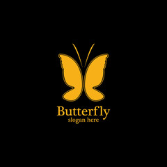 Golden butterfly on black background.logo template for beauty salon,spa salon,etc.