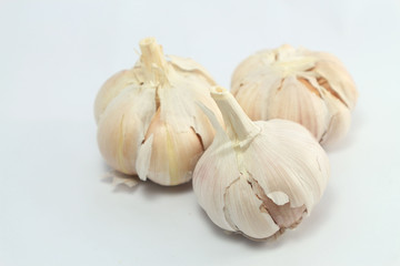 Obraz premium Organic garlic on white background.