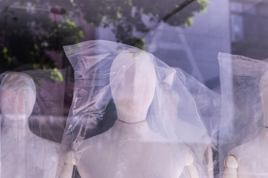 Boutique display window with mannequins