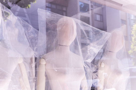 Boutique display window with mannequins