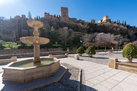 Paseo de los Tristes parallel to the river Darro and at the foot of the Alhambra Palace