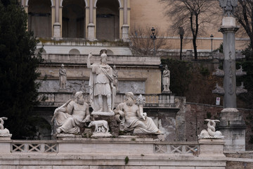 The fountain of the goddess Roma in piazza del popolo, Rome, Italy. Below the slopes of the Pincio