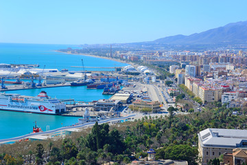 Fototapeta na wymiar Malaga, Spain - March 4, 2020: View of the city of Malaga next to its Port.