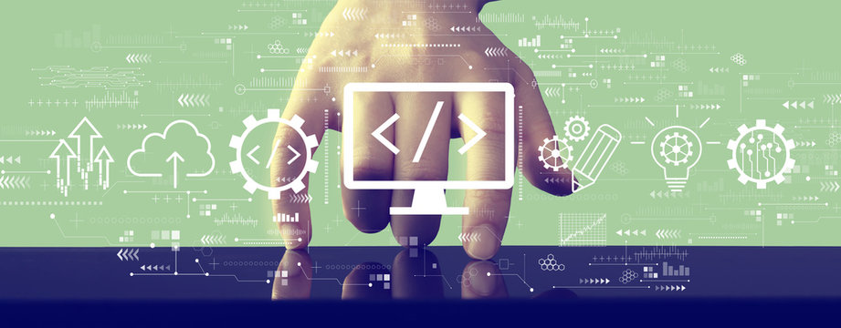 Web development concept with hand pressing a screen of a tablet computer