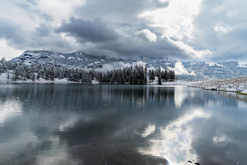 Hiking around a lake in fresh snow at Yellowstone NP