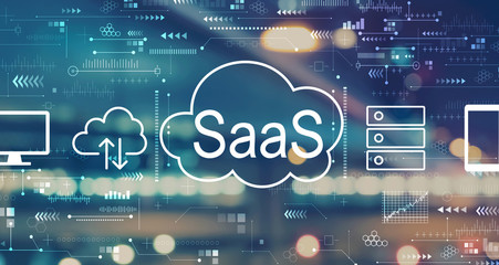 SaaS - software as a service concept with blurred city abstract lights background